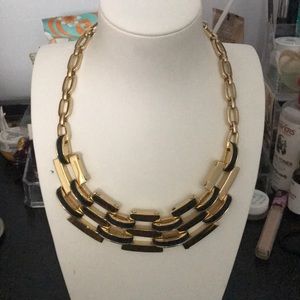 C. Wonder gold and leather necklace
